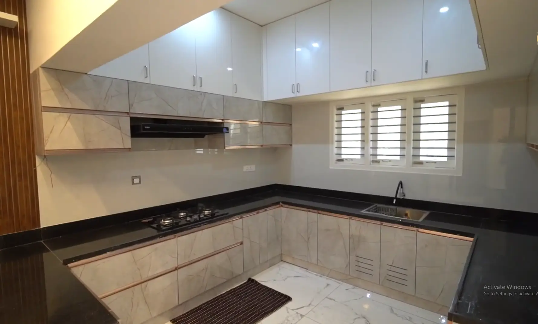 Premium U-Shaped Modular Kitchen with Rose Gold Profiles – Trichy 2025